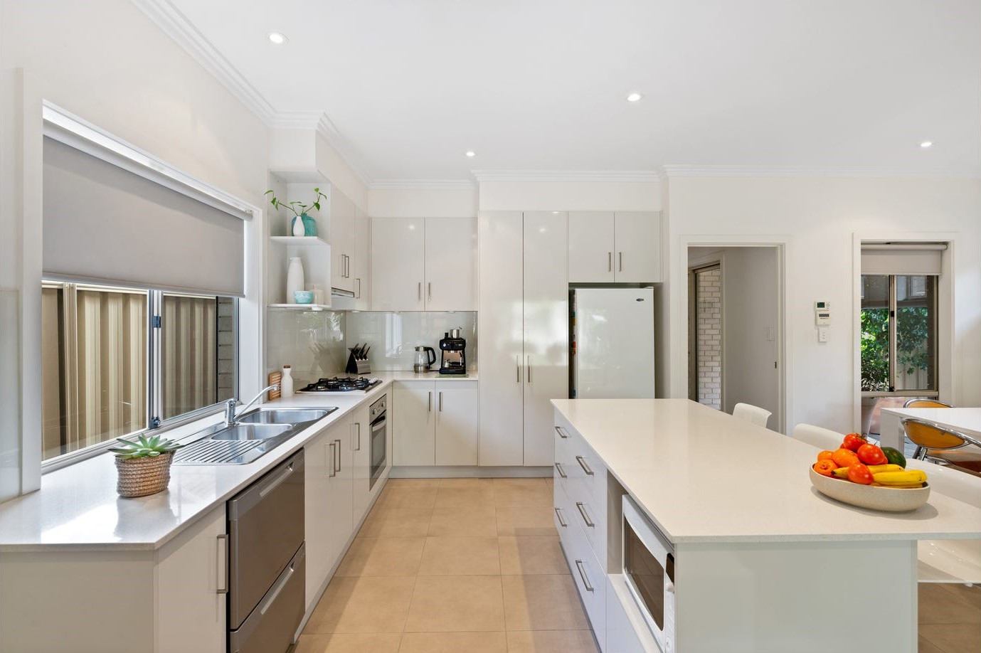 Open-plan kitchen and living area in Orana's Clovelly Park SIL home
Spacious bedroom in Clovelly Park NDIS supported independent living home
Alfresco area and rear garden at Clovelly Park SIL home
