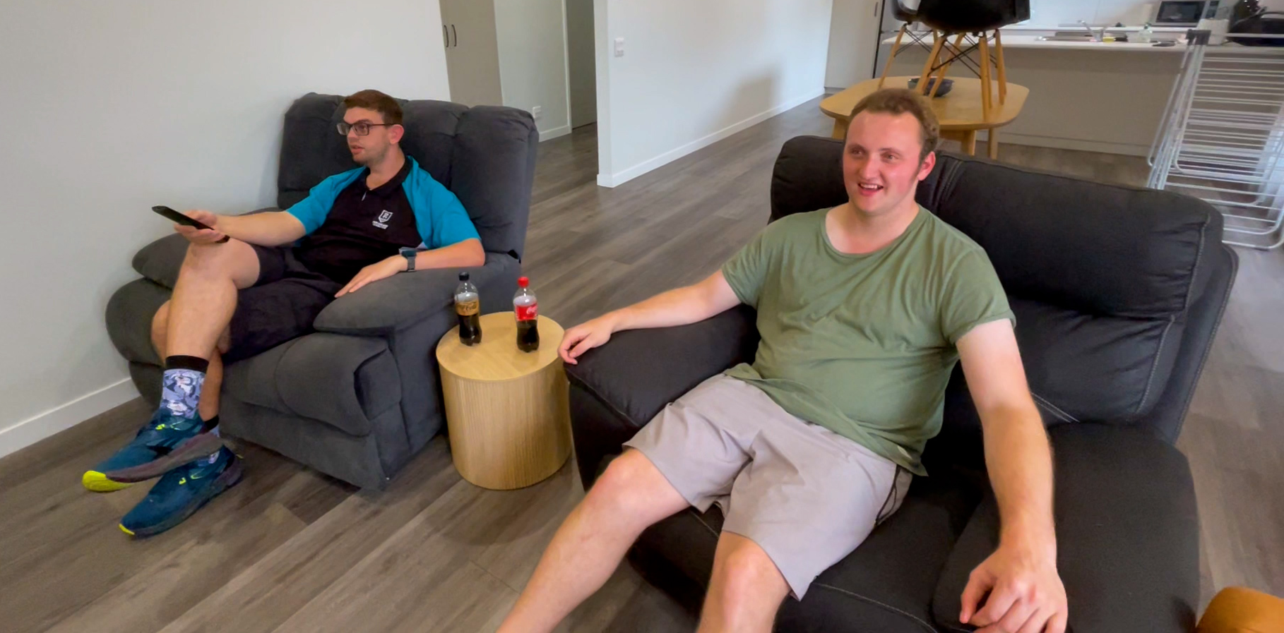 two men sitting in reclining chairs watching tv. Modern Orana SIL home in Loxton, South Australia
Bedroom with private ensuite in Loxton NDIS supported independent living home
Shared BBQ area and paved seating at Loxton SIL homes
